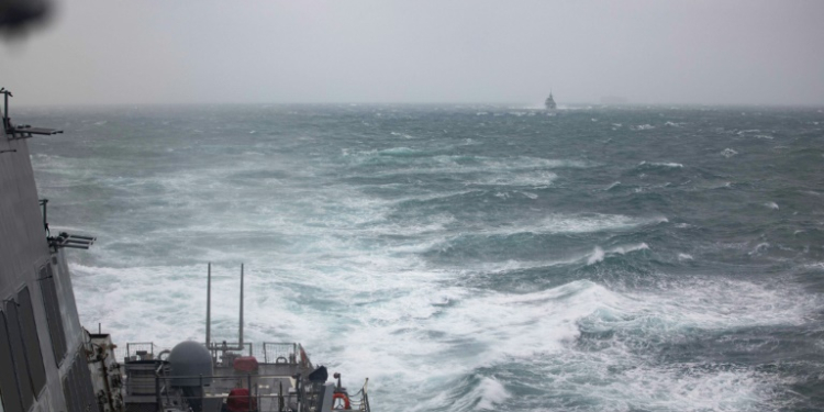 A handout photo taken on October 20 by the US Navy shows the USS Higgins (foreground) and Royal Canadian Navy frigate HMCS Vancouver in the Taiwan Strait. ©AFP