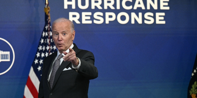 US President Joe Biden offered a testy response to Donald Trump over his criticism of the Biden administration's response to Hurricanes Helene and Milton / ©AFP