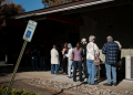 Voters line up in Black Mountain, in hurricane-ravaged North Carolina, to cast their ballots early in the US presidential election / ©AFP