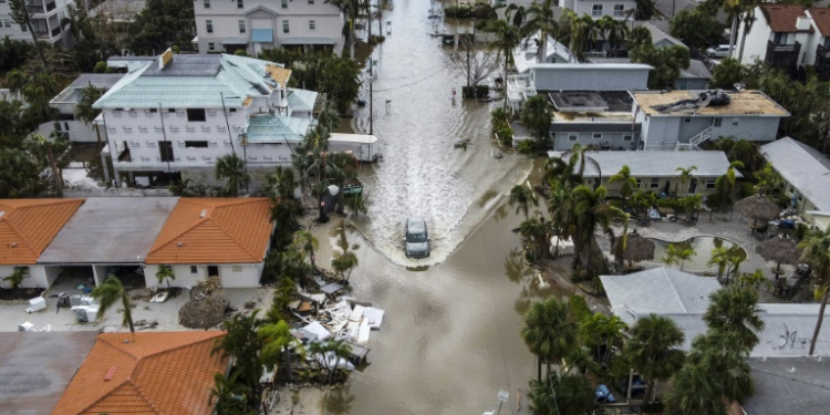 The small town on Siesta Key, with a population of roughly 5,000, was hit hard by dual hurricanes Helene and Milton. ©AFP