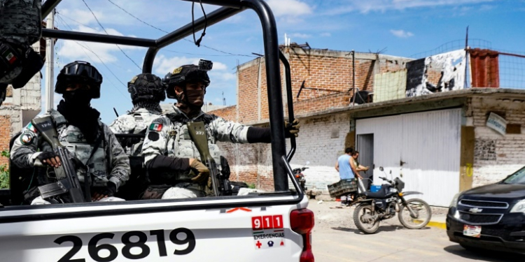 National Guard members patrol outside a rehabilitation center where gunmen killed four people in Mexico's Guanajuato state. ©AFP