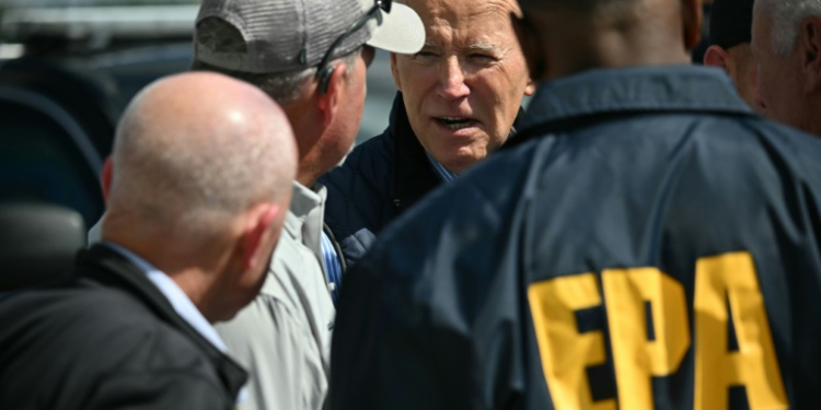 US President Joe Biden  traveled to the Carolinas to see the catastrophic damage from flooding that has wiped out communities and left more than 155 people dead. ©AFP