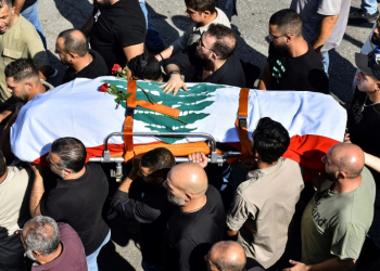 The funeral of Reuters journalist Issam Abdallah, killed in an attack by an Israeli tank in southern Lebanon that also wounded two AFP journalists. ©AFP