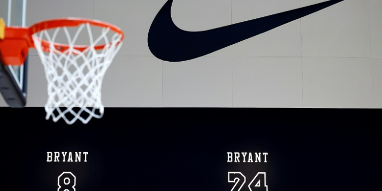 Nike shares fell as it signaled a turnaround from a rocky period would take time . ©AFP