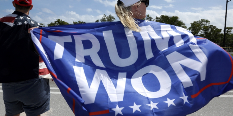 Donald Trump and many of supporters falsely claim he won in 2020 -- and he is expected to again reject the result if he loses in 2024 / ©AFP