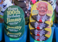 Buttons celebrating former US president Jimmy Carter's birthday are seen at the Plains Peanut Festival on September 28, 2024, in Plains, Georgia / ©AFP