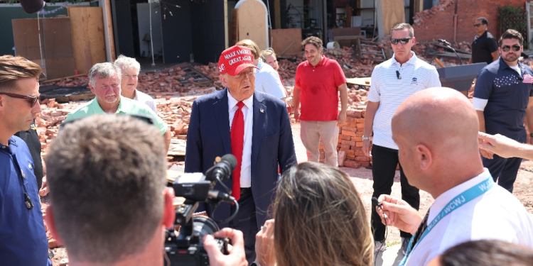 Republican presidential nominee Donald Trump -- pictured inspecting hurricane damage in Valdosta, Georgia -- has been to the state multiple times during the campaign / ©AFP