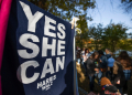 People line up to enter an event where Democratic presidential nominee Vice President Kamala Harris in Grand Rapids, Michigan / ©AFP