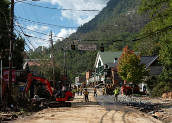 Repair crews at work in downtown Chimney Rock, North Carolina on October 2, 2024. ©AFP