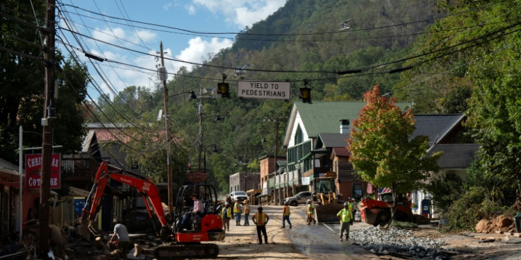 Repair crews at work in downtown Chimney Rock, North Carolina on October 2, 2024. ©AFP