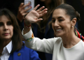 Claudia Sheinbaum waves as she arrives at Congress for her inauguration as the first woman president in Mexican history. ©AFP