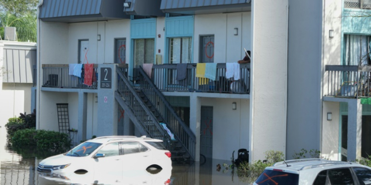 Vehicles are flooded in an apartment complex in Clearwater, Florida, following the passage of Hurricane Milton on October 10, 2024. ©AFP