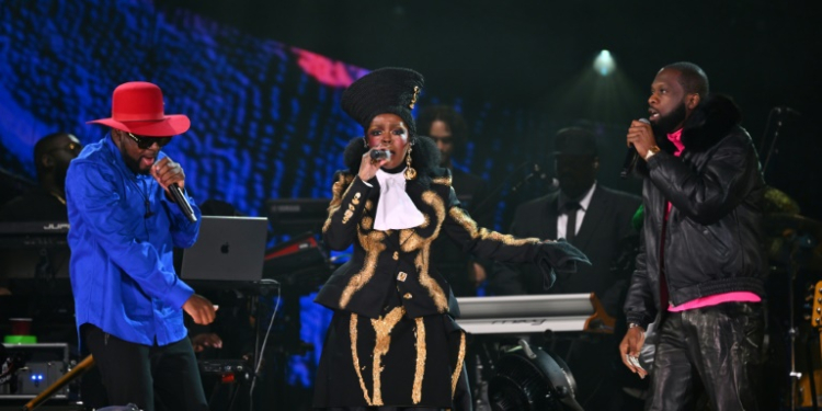 Wyclef Jean (L), Lauryn Hill (C) and Pras Michel (R) of The Fugees perform at the Global Citizen festival, September 2023. ©AFP