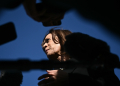 US Vice President and Democratic presidential nominee Kamala Harris talks to reporters before boarding Air Force Two at Joint Base Andrews in Maryland on October 30, 2024. / ©AFP