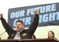 Jon Holden, president of the International Association of Machinists and Aerospace Workers (IAM) District 751, leads a cheer during a strike rally October 15, 2024 in Seattle, Washington. ©AFP