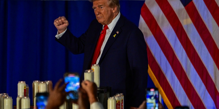 Donald Trump attends a remembrance event to mark the first anniversary of the Hamas attack on Israel at Trump National Doral golf club in Miami, Florida, on October 7, 2024 / ©AFP