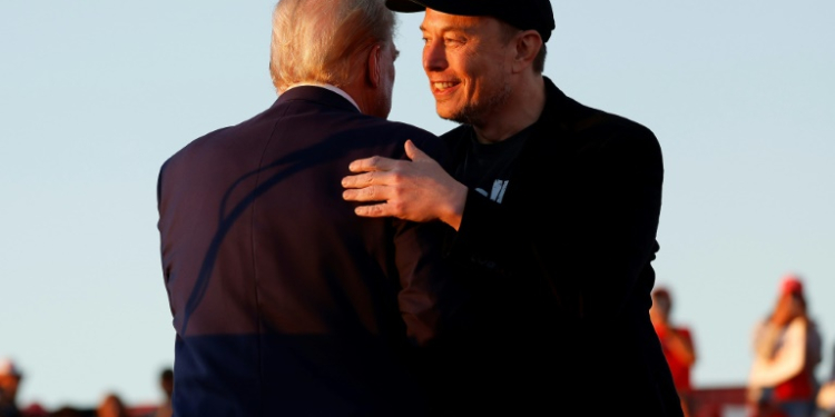 Elon Musk, pictured (right) with Donald Trump at a campaign rally at the Butler Farm Show fairgrounds on October 05, 2024 in Butler, Pennsylvania, has donated $75 million to Trump's reelection effort. ©AFP