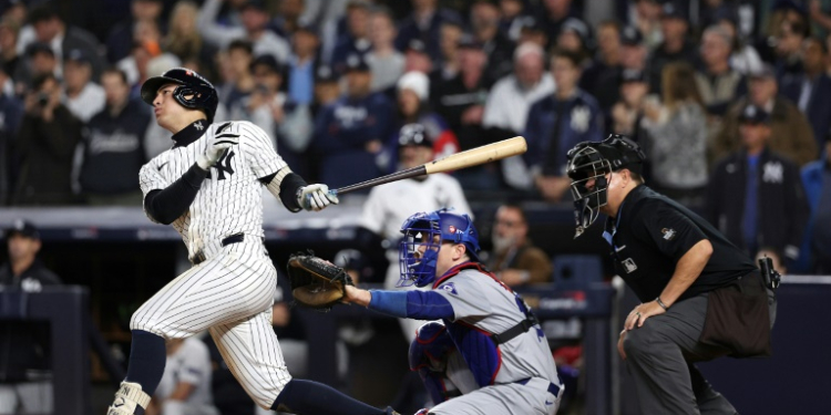 New York's Anthony Volpe hits a grand slam home run to put the Yankees ahead to stay in a World Series victory over the Los Angeles Dodgers. ©AFP