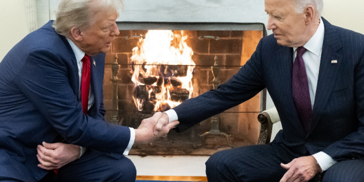 US President Joe Biden shakes hands with US President-elect Donald Trump during a meeting in the Oval Office of the White House in Washington, DC, on November 13, 2024. Trump thanked Biden for pledging a smooth transfer of power as the victorious Republican made a historic return visit to the White House on Wednesday. / ©AFP