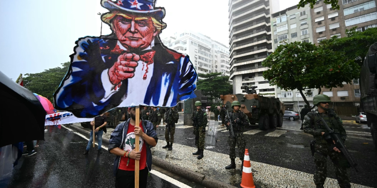 A cardboard cutout of Donald Trump as Uncle Sam at a march in support of the Palestinian people in Rio de Janeiro, Brazil ahead of the G20 Summit / ©AFP