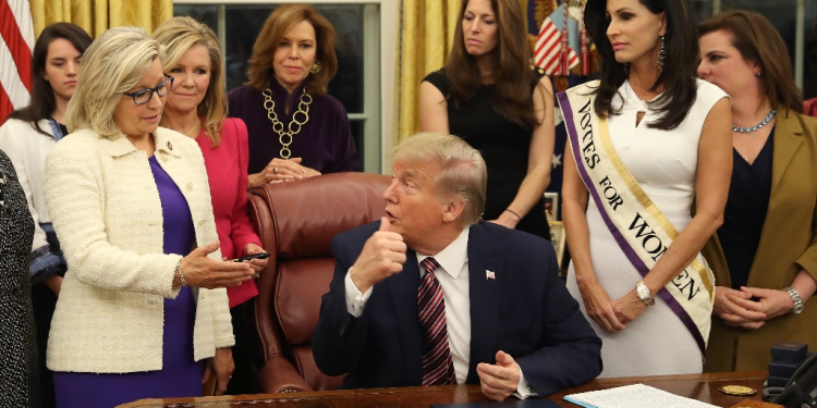 Liz Cheney (left), pictured with Donald Trump at the White House in 2019, fell out of favor with House Republicans / ©AFP