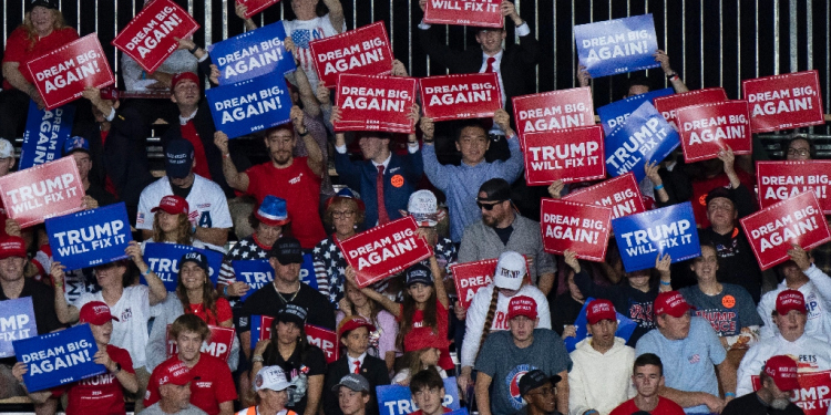 Supporters of former president Donald Trump gather at the civic center in Salem, Virginia, on November 2, 2024 as they await the Republican presidential candidate's arrival  / ©AFP