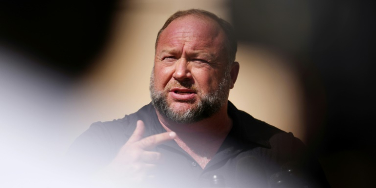 Infowars founder Alex Jones was sued for spreading false claims about a US school shooting -- which put his Infowars website in financial peril. ©AFP