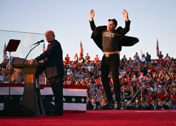 Elon Musk (R), shown joining Donald Trump on stage at a rally in Pennsylvania in October, is poised to have sweeping powers in the Republican's new administration / ©AFP