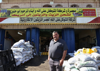 Palestinian-American entrepreneur Jamal Zaglul, in front of his olive press in Turmus Aya, in the Israeli-occupied West Bank, speaks fondly of former US president Bill Clinton / ©AFP