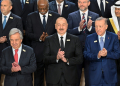 President Ilham Aliyev (C) said Azerbaijan had been subject to 'slander and blackmail' and that no country should be judged for its natural resources. ©AFP