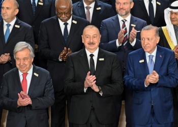 President Ilham Aliyev (C) said Azerbaijan had been subject to 'slander and blackmail' and that no country should be judged for its natural resources. ©AFP