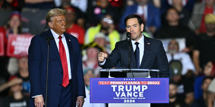 US Senator Marco Rubio, tapped to be the next secretary of state, speaks next to former US president Donald Trump during a campaign rally in Allentown, Pennsylvania, on October 29, 2024 / ©AFP