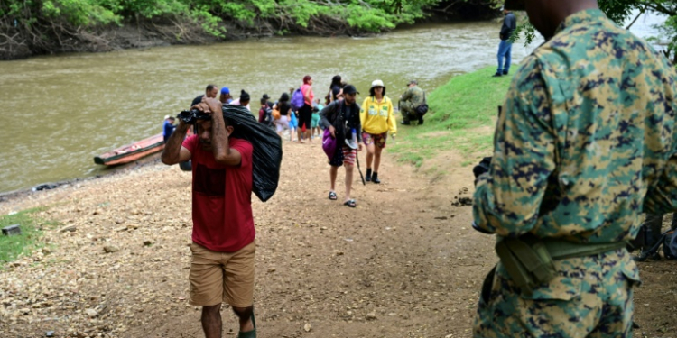 Migrants face inhospitable terrain, wild animals and criminal groups in the Darien jungle . ©AFP