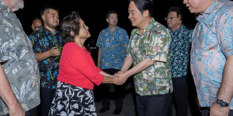 Taiwan President Lai Ching-te (second from right) called on like-minded governments to 'safeguard democracy' during a visit to the US territory Guam. ©AFP