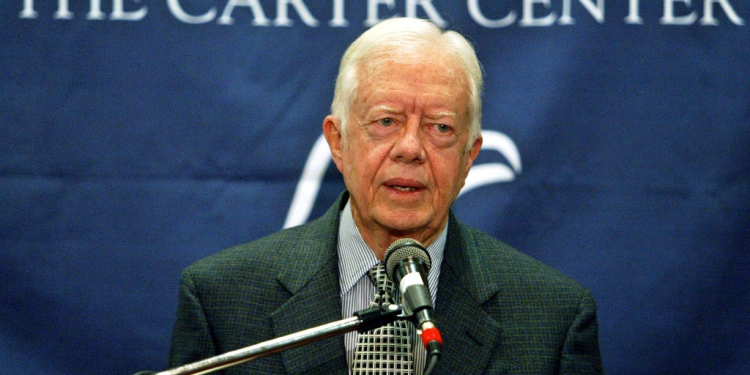 Former US President Jimmy Carter, pictured at a 2004 press conference, was a noted humanitarian in his post-presidency / ©AFP