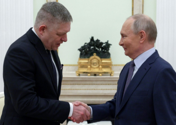 Kremlin insider Pavel Zarubin posted a short video showing the two leaders smiling and shaking hands. ©AFP