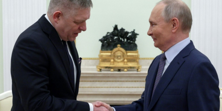 Kremlin insider Pavel Zarubin posted a short video showing the two leaders smiling and shaking hands. ©AFP