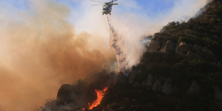 Aircraft have proved vital in the fight against the fire raging through Malibu. ©AFP