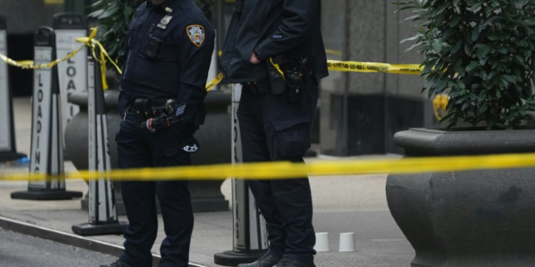 New York police confirmed a shooting with officers swarming around the area around the Hilton hotel. ©AFP