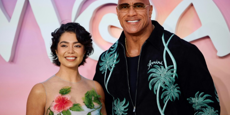 US actors Auli'i Cravalho (L) and Dwayne Johnson pose on the red carpet at the UK premier of "Moana 2," in London in November 2024. ©AFP