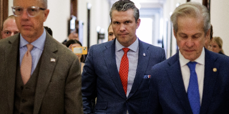 Pete Hegseth (C), US President-elect Donald Trump's nominee to be secretary of defense, leaves a meeting he held with Senator Tom Cotton as part of an effort to win over support for his confirmation on Capitol Hill / ©AFP