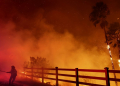 A firefighter battles the Franklin blaze in Malibu, California on December 10, 2024. ©AFP