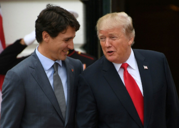 US President Donald Trump, seen here with Trudeau in October 2017, is now teasing that Canada should become the 51st US state. ©AFP