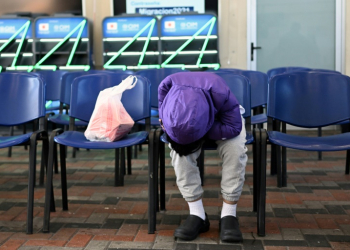 A Guatemalan migrant deported from the United States waits at the Returnee Reception Center upon arrival at the Guatemalan Air Force Base in Guatemala City. ©AFP