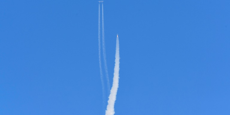 The Virgin Galactic SpaceShipTwo space plane Unity and mothership flies above Spaceport America, near Truth and Consequences, New Mexico on July 11, 2021. ©AFP