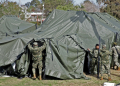 Mexican troops set up a temporary shelter near the US border in the northeastern city of Matamoros. ©AFP