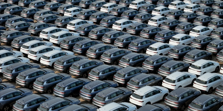 BYD electric cars for export wait to be loaded onto a ship at a port in Yantai, in eastern China's Shandong province / ©AFP