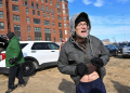 Kevin Loftus, seen here in the clothing he was given by a prison in Philadelphia, was waiting outside a Washington prison for the release of more pardoned inmates / ©AFP