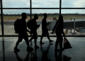 Brazilians deported from US walk  at Eduardo Gomes International Airport in Manaus, Amazonas state, on January 25, 2025 / ©AFP