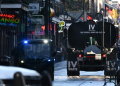 A truck cleans Bourbon Street in the French Quarter of New Orleans, Louisiana on January 2, 2025, one day after a terrorist attack that left at least 14 people dead and 30 injured. ©AFP